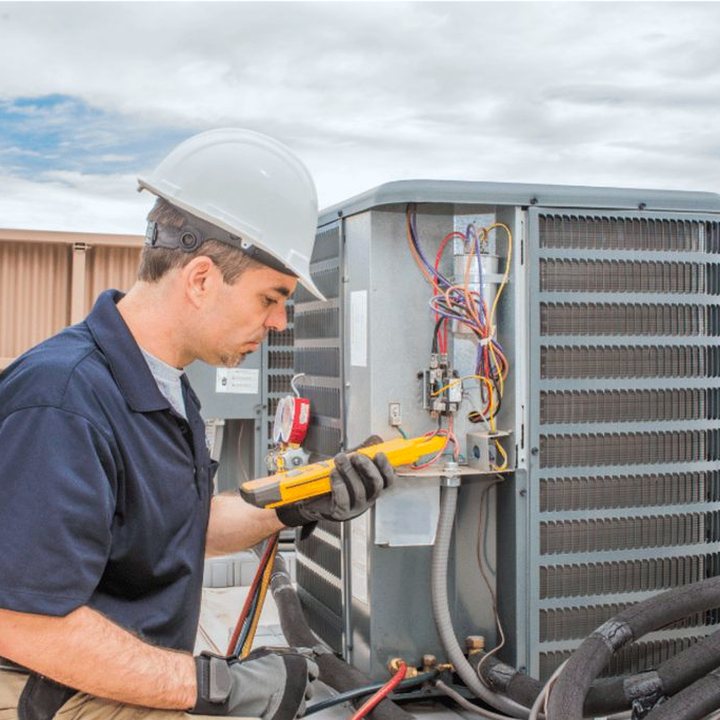 Petrolia Heating & Cooling HVAC technician on a service call in Petrolia, Ontario